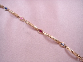 PULSERA ORO 18KT MEDIA CAÑA 4MM PIEDRAS OVALES 18CM PESO 7,25G