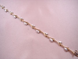 PULSERA ORO 18KT ESPIGA BICOLOR 20CM D7,3X2,3MM PESO G8,55