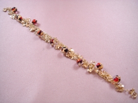 PULSERA ORO 18KT CON PIEDRAS FINAS DE COLOR PESO G10,85, LONGITUD 18,5CM